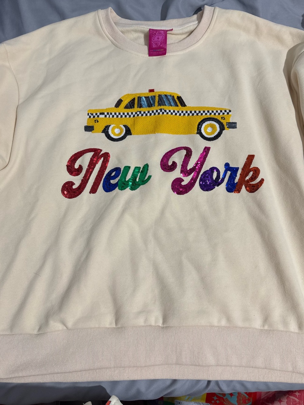 QUEEN OF SPARKLES Cream Sweatshirt with Yellow Taxi and Multicolor "New York"